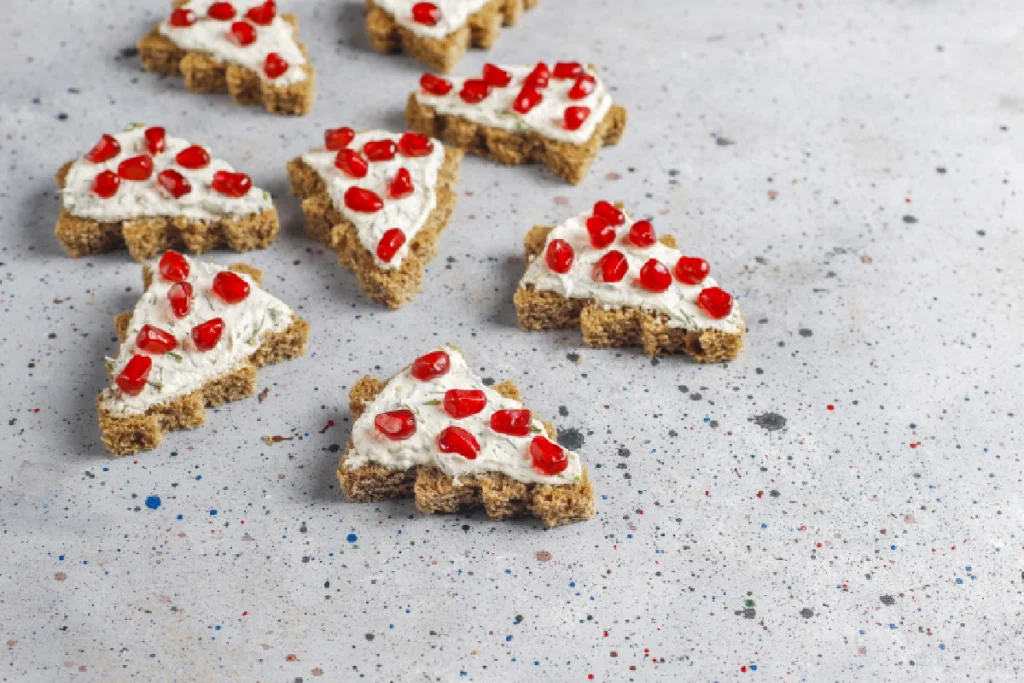 Close-up of a Good Humor strawberry shortcake bar showing its creamy strawberry center and crumbly cake coating